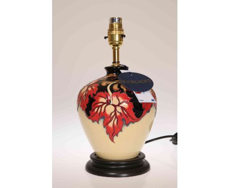 A MOORCROFT "OCTOBER" TABLE LAMP, first quality, retains original price label of £310. 21cm high to neck of pot