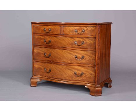 A FINE QUALITY MAHOGANY SERPENTINE CHEST OF DRAWERS IN GEORGE III STYLE, the moulded top over two short above three long grad