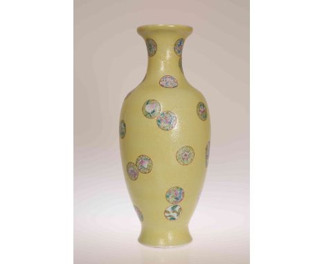 A CHINESE YELLOW SGRAFFITO GROUND VASE, LATE 19TH/EARLY 20TH CENTURY, of shouldered ovoid form, decorated with scattered meda