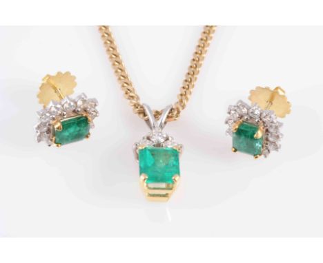 AN EMERALD AND DIAMOND PENDANT, the square cut emerald four claw set to the bottom of three brilliant cut claw set diamonds, 