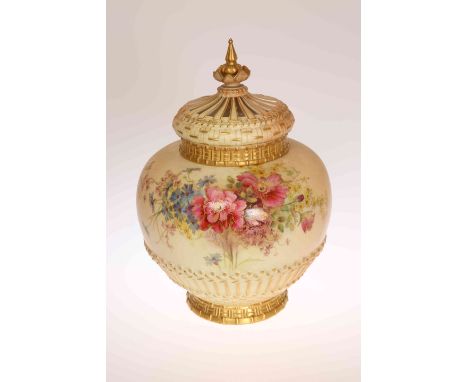 A LARGE ROYAL WORCESTER POT POURRI VASE, COVER AND INNER COVER, NO. 1286, painted and gilded with a floral spray above moulde