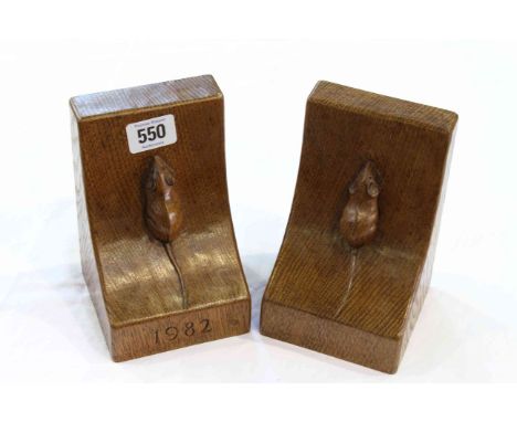 ROBERT THOMPSON OF KILBURNA PAIR OF MOUSEMAN OAK BOOKENDS, DATED 1982, of characteristic form, each with carved mouse signatu