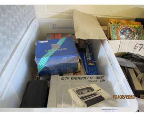 PLASTIC CASE CONTAINING A COMMODORE 64 COMPUTER TO INCLUDE THE DATASSETTE UNIT MODEL C2N, GAMES, AN OLYMPUS CAMERA