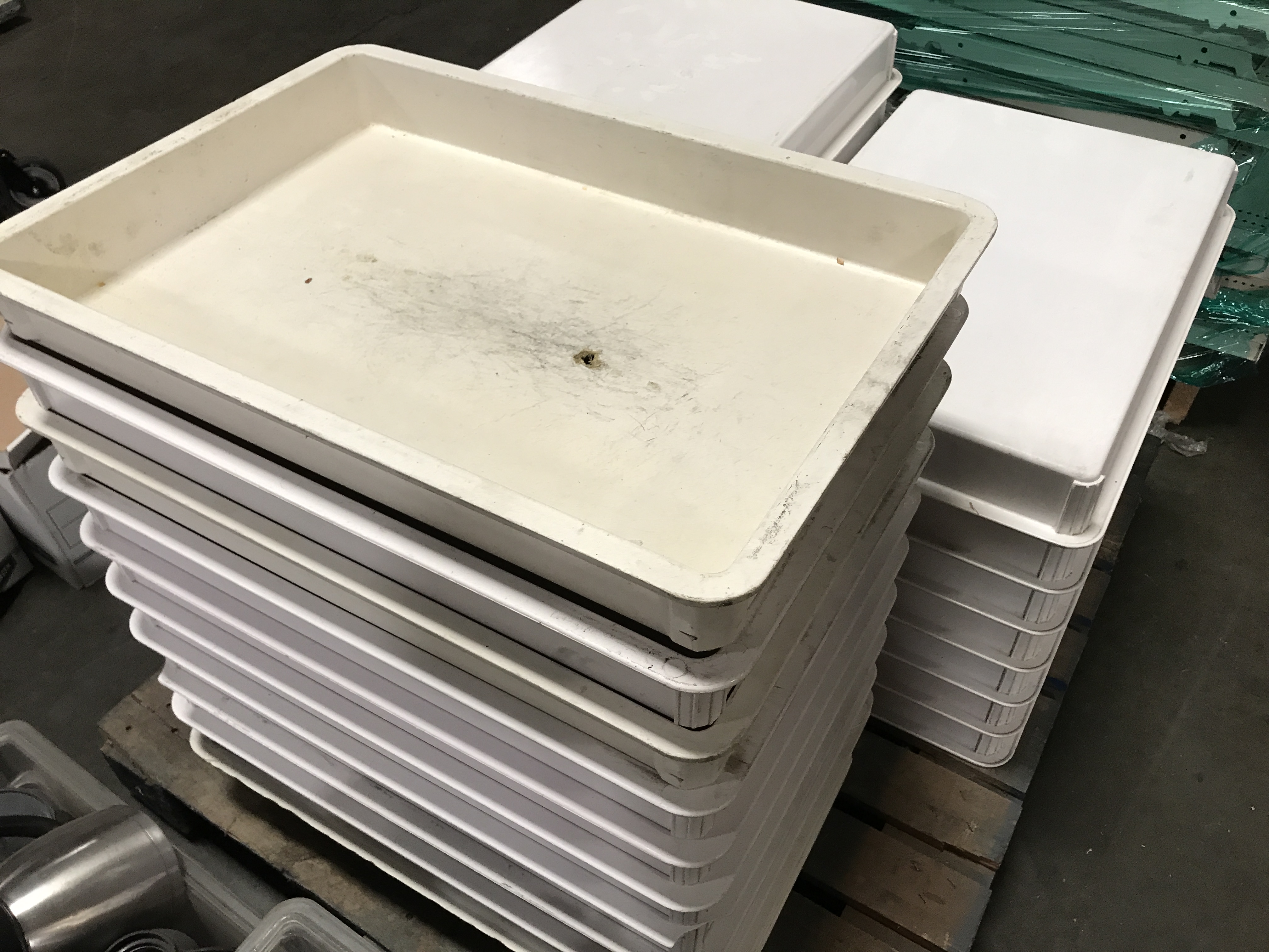 Pallet of plastic stackable trays