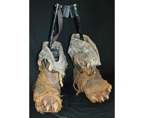Stage Props - A Christmas Carol - a pair of stilt boots, worn by Edward Woodward.as the Ghost of Christmas Present, 83cm high