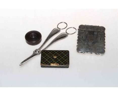 Pair of crafted EP grape scissors, EPNS card case, Mauchline ware snuff box and a carved seal (4).