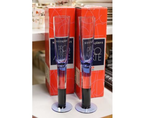 Two boxed Iittala Nuutajarvi Pro Arte Cordial glasses, signed K Nurminen Nuutajarvi, 25 cms high.