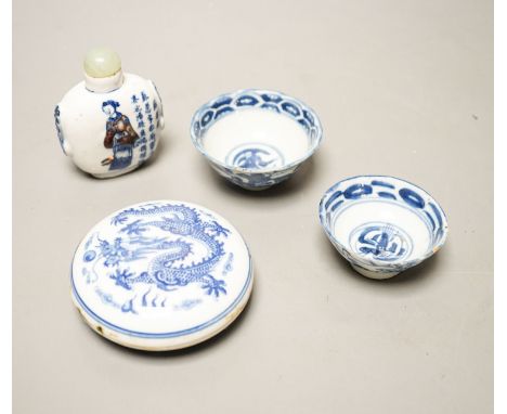 A Chinese underglaze blue and copper red snuff bottle, late 19th century, two blue and white bowls and a box and cover (4) 8.
