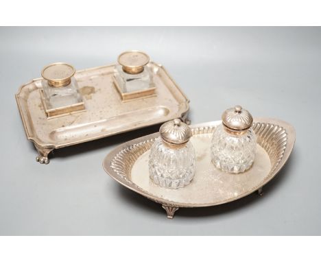 A presentation silver oval inkstand, with two mounted glass wells, William &amp; John Barnard, London, 1884, ‘presented to Mi