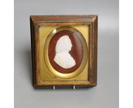 A crystalline stone relief portrait plaque of a gentleman, indistinctly signed, 8cm