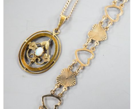 A 9ct and heart shaped link bracelet, 18cm and a yellow metal and opal pendant on a yellow metal chain,gross 6.5 grams.