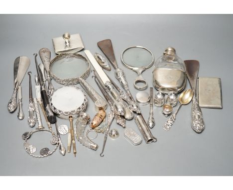 A mixed group of mainly small silver to include two magnifying glasses, a hip flask, silver-handled shoe horns, Georgian snuf