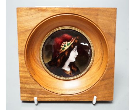 A framed Limoges enamel portrait miniature, 7.5cm diameter