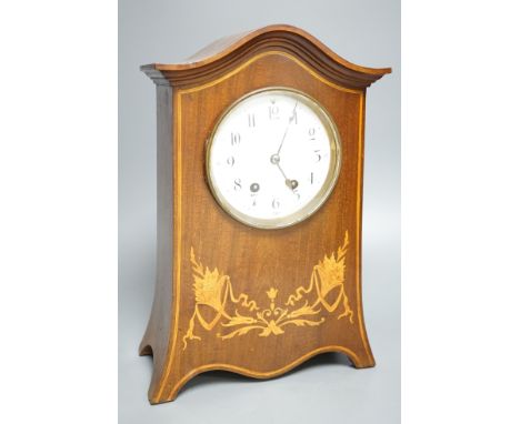 An Edwardian inlaid mahogany mantel clock with French gong-striking movement, 39cm.