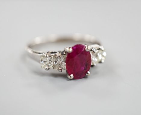 A modern 750 white metal single stone ruby and four stone princess cut diamond set half hoop ring, size M, gross weight 3.2 g