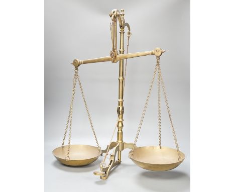 A Doyle &amp; Son, London brass balance scale, 55cm. high