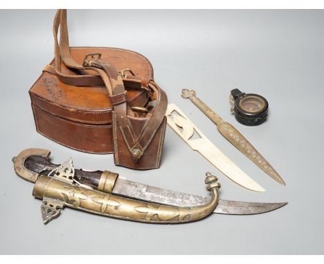 An Eastern dagger, in sheath, leather collars box, cased early 20th century Dollond compass and three others