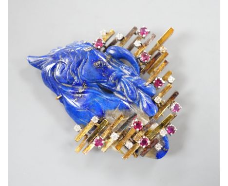 A 585 yellow metal, ruby, diamond and apis lazuli set modernist brooch, maker's mark KK, width 52mm, gross weight 21.4 grams