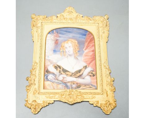 19th century ormolu framed portrait miniature on ivory of a young lady with auburn hair. Length of frame - 23cm