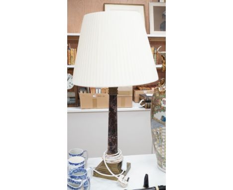 A brass and variegated marble Corinthian column lamp base, 47cms high, not including light fitting.