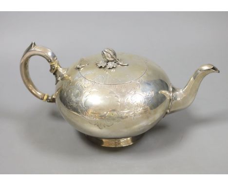 A Victorian engraved silver teapot by William Robert Smily, London, 1952,gross 20.5oz.