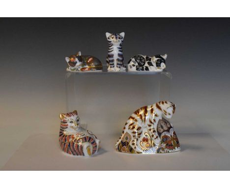 Five Royal Crown Derby paperweights, comprising Bengal Tiger Cub, and three cats, all with gold buttons; together with a bell