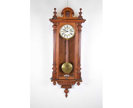 Three weight-driven Vienna wall clocks and a spring driven wall clock, 124cm high and smaller (4)
