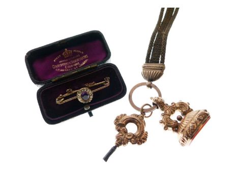 Gilt and hairwork Albertina with carnelian set fob seal and watch key, date inscribed 1838, and an unmarked amethyst and seed