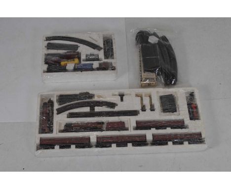 Hornby - 'Duchess of Sutherland' 00 gauge railway train set, together with another Hornby trainset, etc. both lacking top cov