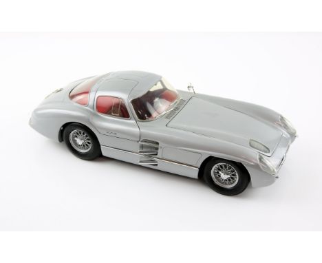 Mercedes Benz 300 SLR Gullwing-style (1:12 scale) by 'Revell' Model Car - silver with red interior, 1954. Made in 1999 with p