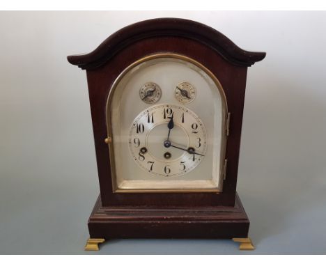 A mahogany cased bracket clock with silvered dial on gilt feet, name on back Wurtenberg B21 38cm high, 19.5cm deep, 27cm wide