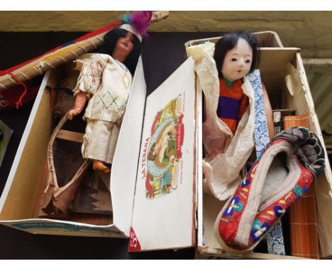 A collection of Tourist items, including native American Indian doll, toys, Japanese doll etc.