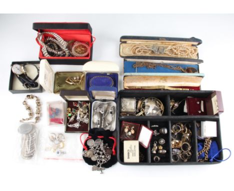 A large collection of costume jewellery to include a silver charm bracelet, a banded agate locket and chain, necklets, scarf 