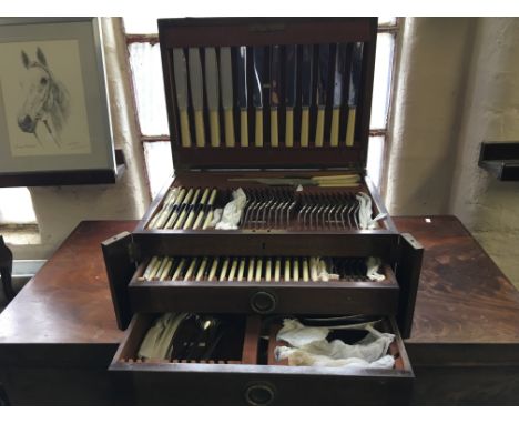 An oak cased cutlery set Harrison Bros & Howson fitted with two drawers.