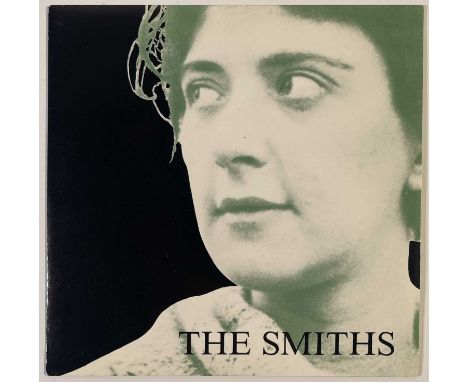 THE SMITHS - GIRLFRIEND IN A COMA 7" (ORIGINAL UK MISPRINT - RT 197). 1987 UK 7" single with mispressed sleeve. A classic exa
