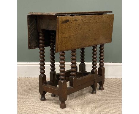 ANTIQUE OAK GATELEG TABLE with bobbin supports, 71 (h) x 30/81 (w) x 71cms (d)Provenance: private collection Denbighshire