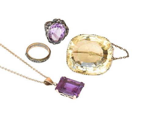 A citrine brooch, length 3.7cm; an amethyst ring, stamped 'SILVER', finger size I; a silver ring; and a synthetic corundum pe