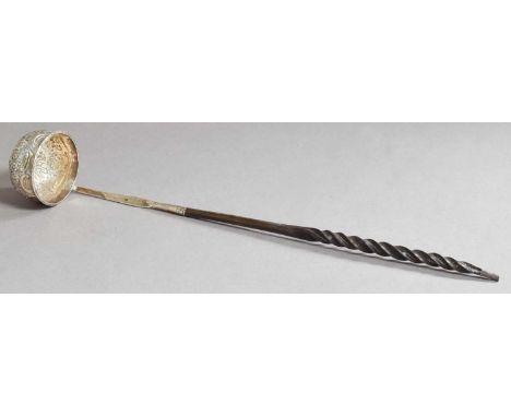 A George III Silver Toddy Ladle, Marked with Duty Mark Only, Circa 1784, the bowl circular and chased with foliage scrolls an