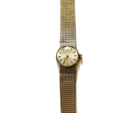 A lady's 9 carat gold Longines wristwatch, 1968, manual wound lever movement, silvered dial with baton markers, Longines 9 ca