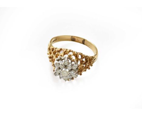 An 18 carat gold diamond cluster ring, finger size T1/2Gross weight 6.0 grams.