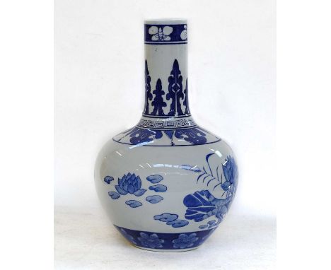 A large modern Chinese blue and white bottle vase and assorted other Asian art, including: two abacus, wood printing blocks, 