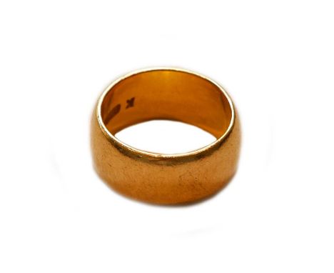 A 22 carat gold band ring, finger size MGross weight 13.3 grams.