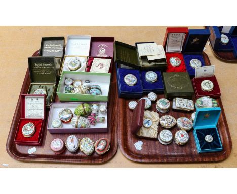 A collection of thirty seven variuous enamel trinket boxes by Halcyon Days, English Enamels and others, some boxed (two trays
