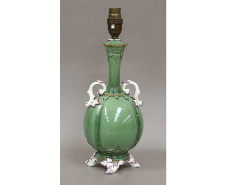 A Royal Worcester table lamp, green glazed with foliate handles and feet, 27cm (excluding fittings)The base is broken off but