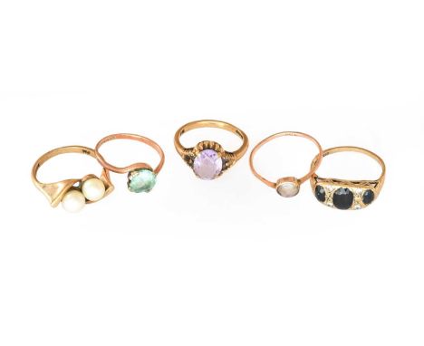 A 9 carat gold amethyst ring, finger size K; a 9 carat gold cultured pearl ring, finger size L; together with two further 9 c