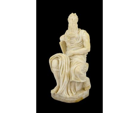 After Michelangelo Buonarroti (1475-1564): An Alabaster Figure of Moses, seated, a tablet under his right arm, on a canted re