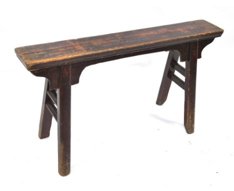 A Chinese stained pine bench, late 19th century, 52 cm high x 96 long cm x 32 cm