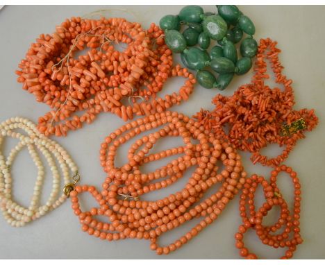 A graduated antique coral bead necklace to/w a long coral bead necklace, 146 cm, long stick coral necklace, 140 cm; a two-row