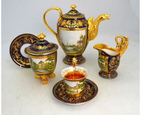 A regal tete a tete porcelain set with gilt decoration and medallions depicting the Royal Chateau in Berlin, Charlottenburg P