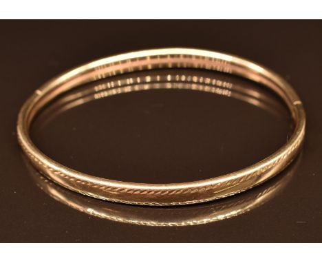A 9ct gold bangle, 6.3g, 6 x 5cm